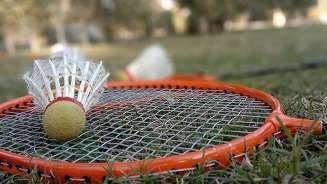 Badminton and shuttlecocks on grass close up focus shot